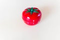 Red tomato-shaped timer on white background. Home related, home staying. Free copy space Royalty Free Stock Photo