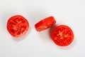 Red Tomato slice isolated on white background, top view Royalty Free Stock Photo