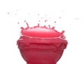 Red tomato strawberry juice spill splash in glass bowl, Red blood wave fall in air. Red Wine colored explosion spill out up. White Royalty Free Stock Photo