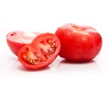 Red tomato vegetable with cut Royalty Free Stock Photo