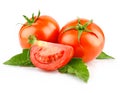 Red tomato vegetable with cut and green leaves Royalty Free Stock Photo