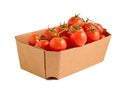 Red tomatoes in a cardboard box