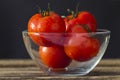 Red tomatoes in a glass bowl