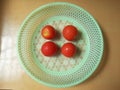 Red Tomatoes.Red tomatoes are in reverse in a plastic basket Royalty Free Stock Photo