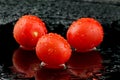 Red tomatoes with water