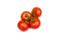 Red tomatoes on a white background. Isolated. Royalty Free Stock Photo