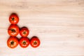 Red tomatoes on wooden ground Royalty Free Stock Photo