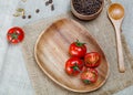 Red tomatoes in wooden plate 2 Royalty Free Stock Photo