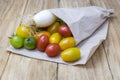 Red tomatoes, yellows, greens and scallions