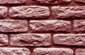 Red toned brick wall surface. Royalty Free Stock Photo