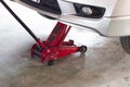 Red tool hydraulic jack lift car