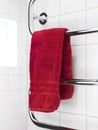 Red towel on a dryer Royalty Free Stock Photo