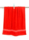 Red towel hang on rack with clip Royalty Free Stock Photo