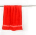 Red towel hang on rack with clip Royalty Free Stock Photo