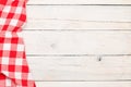 Red towel over wooden kitchen table Royalty Free Stock Photo