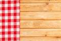 Red towel over wooden kitchen table Royalty Free Stock Photo