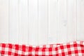 Red towel over wooden kitchen table Royalty Free Stock Photo