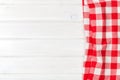 Red towel over wooden kitchen table Royalty Free Stock Photo