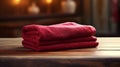 Red Towels On Wooden Table: A Poetic Study In Maroon