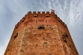 Red tower Kizil Kule in Alanya on a cloudy day