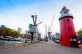 Red tower and Leuvehaven during day in Rotterdam