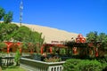 Red tower of vintage Peruvian building against the sand dunes of Huacachina desert, Huacachina oasis town, Ica region, Peru Royalty Free Stock Photo