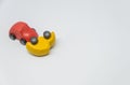 Red toy car crashed yellow toy car accident with white background Royalty Free Stock Photo