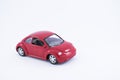 Red toy car with white background. Royalty Free Stock Photo