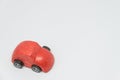 Red toy car with white background and selective focus Royalty Free Stock Photo