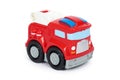 Red toy firefighter car, isolated on white background, fire truck engine Royalty Free Stock Photo