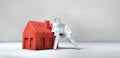 Red toy house with silver keys Royalty Free Stock Photo