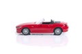 Red toy or model convertible sport car.