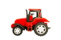 Red toy tractor isolated on white background Royalty Free Stock Photo