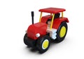 Red toy tractor vehicle, simple volume on white background Royalty Free Stock Photo