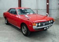 Red Toyota Celica parked inside a garage Royalty Free Stock Photo