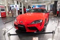 Red Toyota GR Supra. Front view. Close-up. Toyota City Showcase Mega Web Palette Town