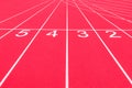 Red track and field lanes and numbers. Running lanes at a track and field athletic center. Horizontal sport theme poster, greeting Royalty Free Stock Photo