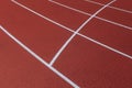 Red track and field lanes. Running lanes at a track and field athletic center. Horizontal sport theme poster, greeting cards, head