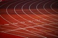 Red Track with Precise White Lines and Sequential Numbers: A Visual Representation of Athletic Preparation and Precision - Track