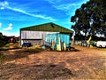 Red Tractor And Barn On Farm In Northumberland, England. Royalty Free Stock Photo