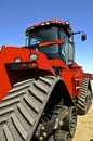 Red tractor with continuous track Royalty Free Stock Photo
