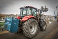 Red tractor at the Port au Bressin Royalty Free Stock Photo