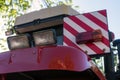 Red tractor tail lights in the parking lot Royalty Free Stock Photo