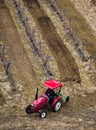 Red Tractor Working in Field Royalty Free Stock Photo