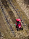 Red Tractor Working in Field