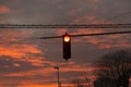 Red traffic light at the background of the evening sky Royalty Free Stock Photo