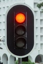 Red traffic light on city highway road close up. Traffic light on urban street. Royalty Free Stock Photo