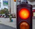 Red traffic light in the city street close Royalty Free Stock Photo