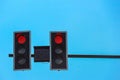 Red traffic light with clear blue sky as background. Royalty Free Stock Photo