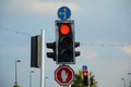 Red traffic light and Go straight or left and Stop signs. Mandatory and Prohibitory signs. Road signs in Israel